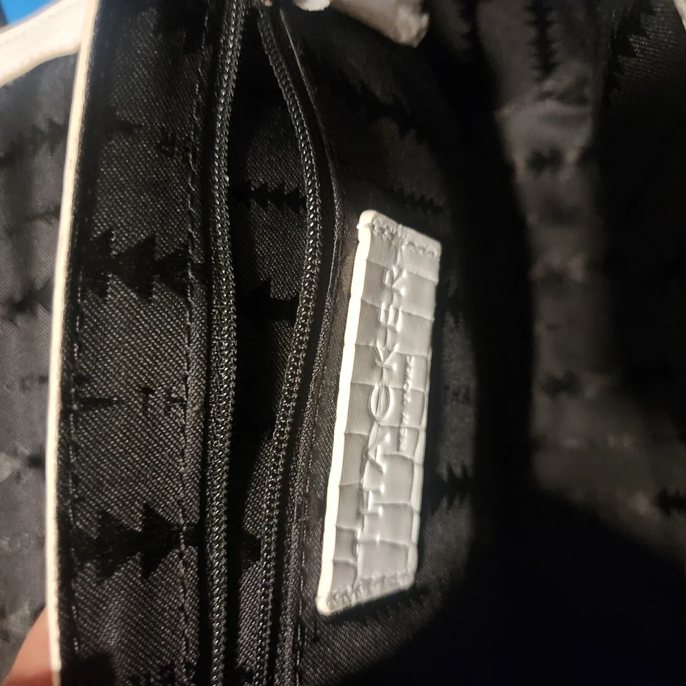 Thacker NYC purse in a crisp white croc embossed finish